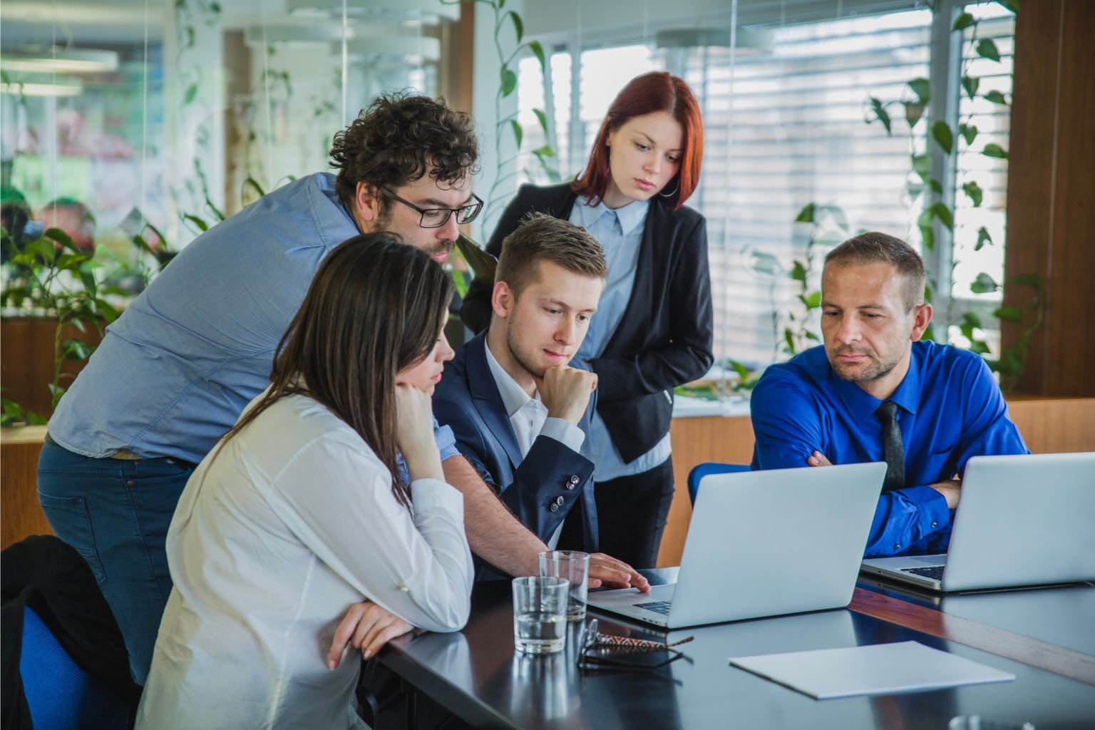 Vibrant Web Tech team discussing a client development project